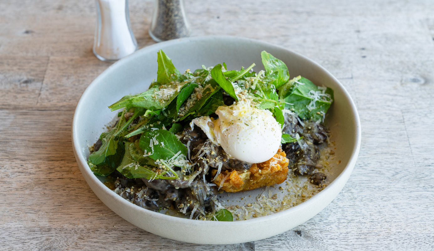 Stir fried sprouting broccoli with poached eggs recipe